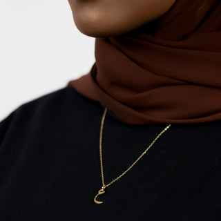 Gold Arabic Letter Necklace for women, featuring a personalised initial design.